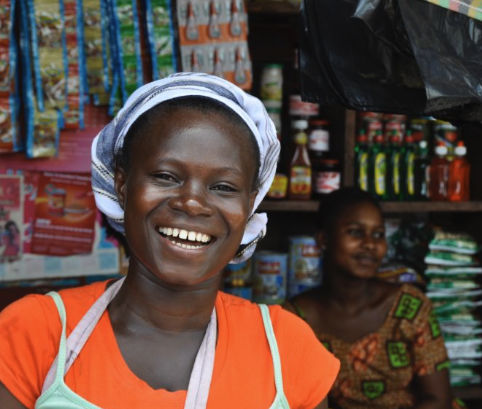 Business owners in a Nigerian shop planning financing and growth